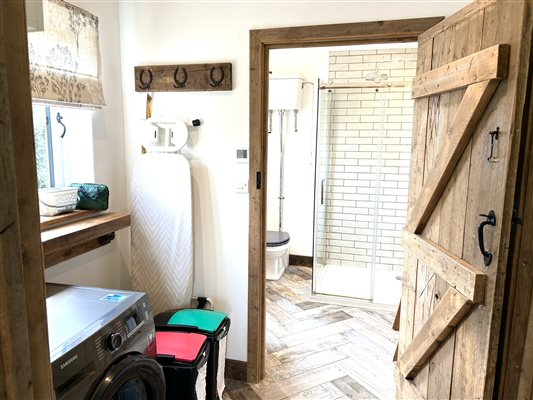 Utility leading to downstairs bathroom Deer Den