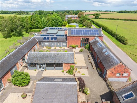 Cranmer Country Cottages courtyards and pool