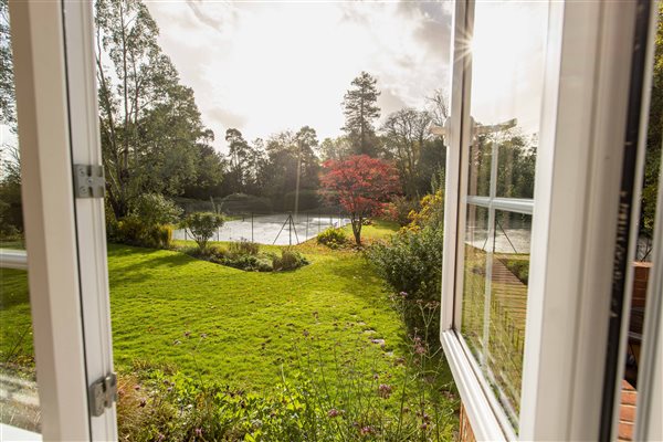 bedroom view over lush gardens