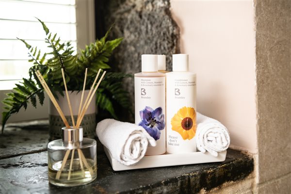 Toiletries in the window of a luxury farm holiday cottage