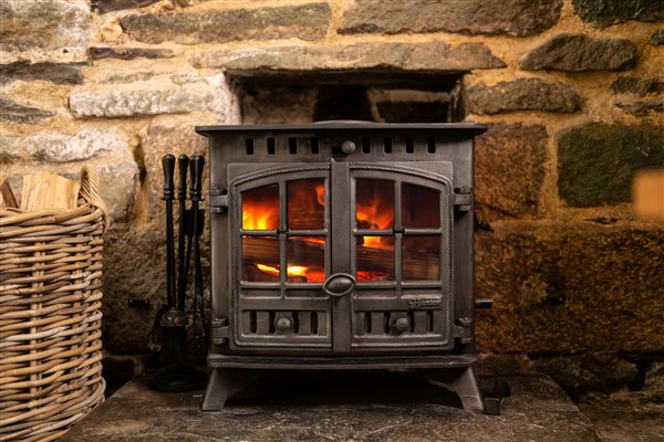 Woodburning stove in a luxury farm holiday cottage