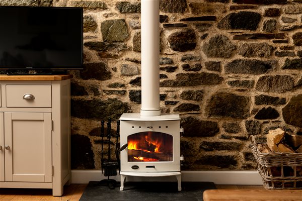 Woodburning stove in a luxury holiday cottage, Cornwall