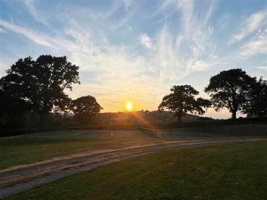 Tennis court at sunset