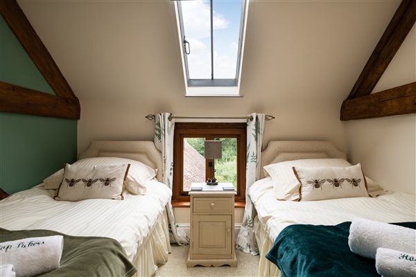 twin room with window and over head sky light