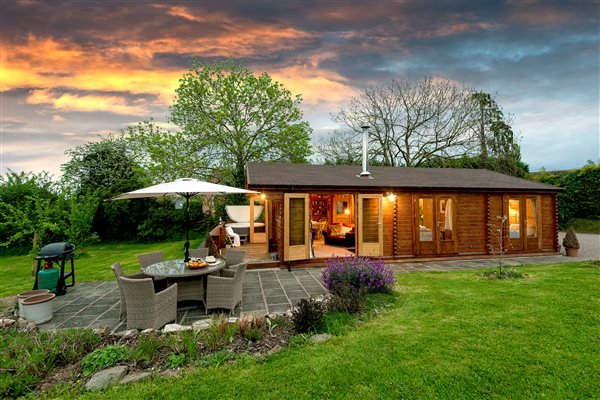 Nestled in quiet corner of the orchard lies the Cabin