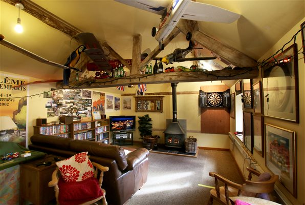 Character Games room with log burner