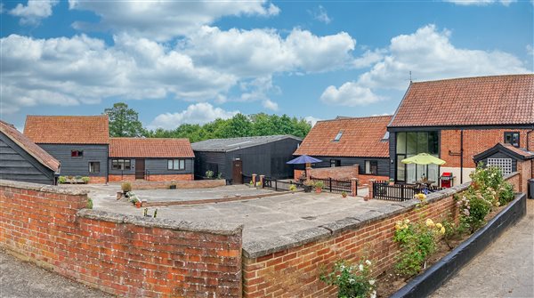 Th courtyard, with The Old Corn Mill on the right hand side.