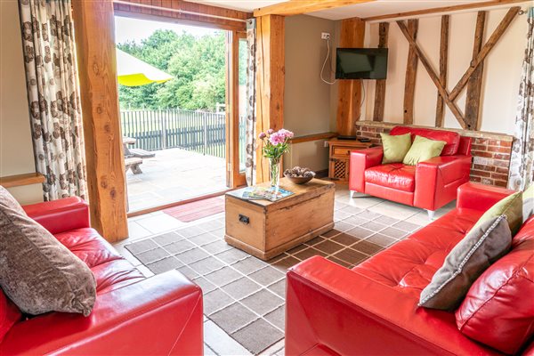 Henrys Barn beamed sitting room with beautiful views