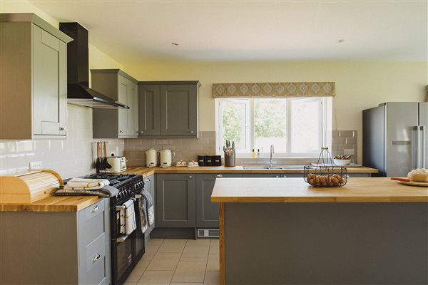 Open plan kitchen, dining and living spaces