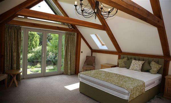 Bedroom looking out onto garden