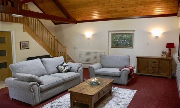 lounge showing stair to bedroom