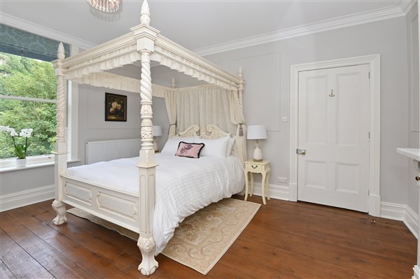 Beautiful 4 Poster Bedroom at Portland House in Matlock Bath at MyCountryHouses.co.uk