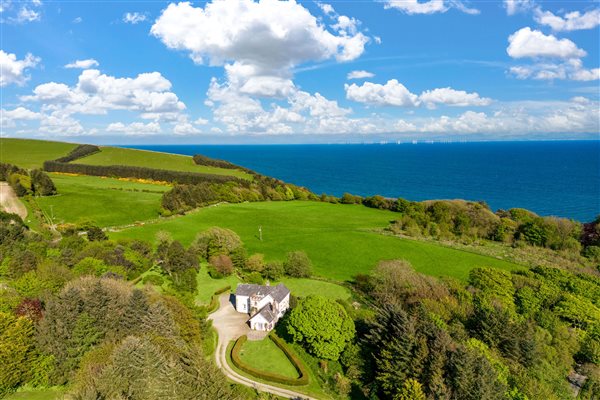 Sea views, extensive garden and mixed woodland at Auchengashell