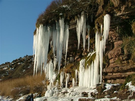 Dramatic winter icicles at Orroland shore