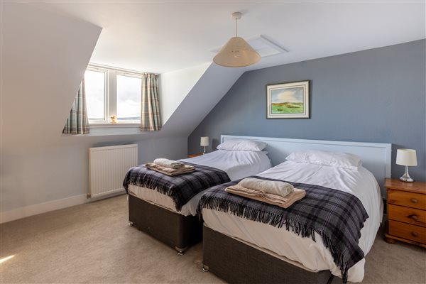 This bedroom can be a twin or king