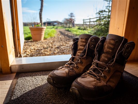 hare boots by door