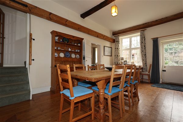 Gaffers dining room showing stairs to bedrooms