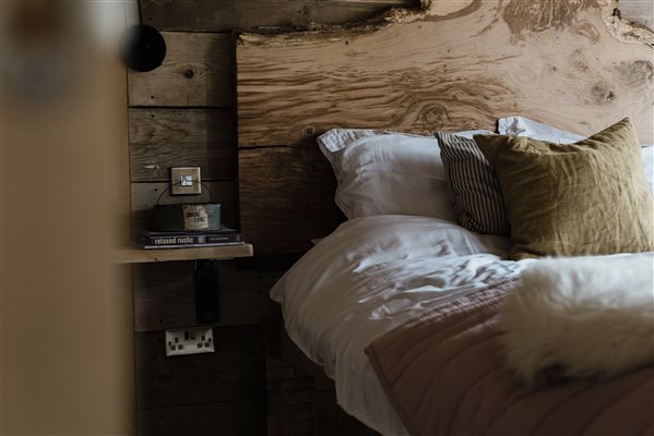 Kingsize bed with oak headboard