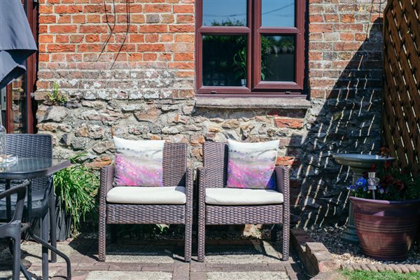 otter holt patio sunny eating area