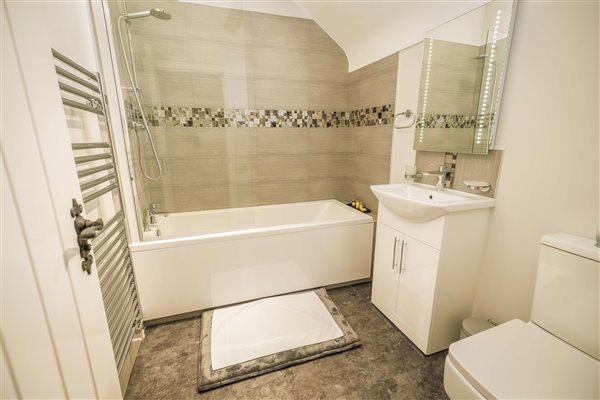 Ensuite with bath and overhead shower